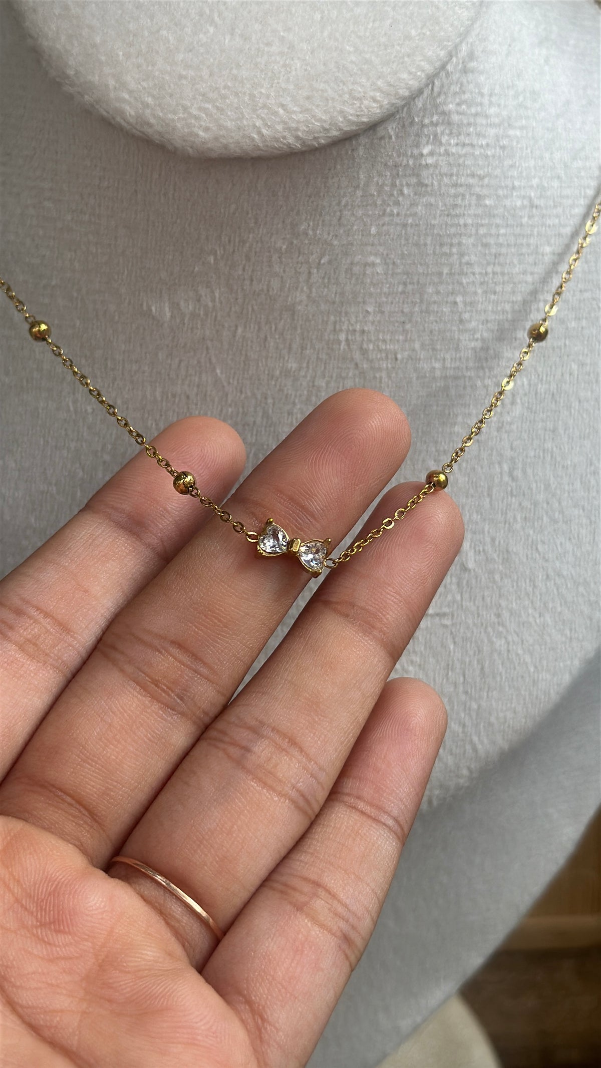 Bow stone pendant
