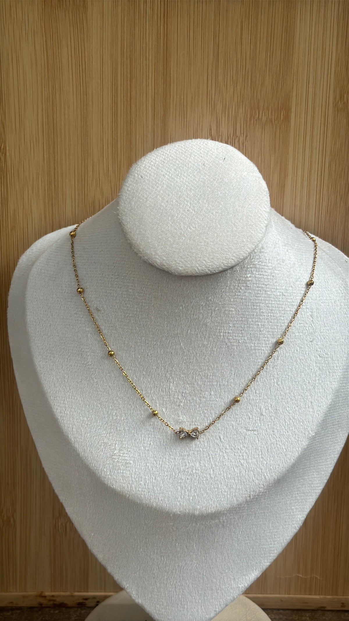 Bow stone pendant